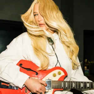 Kesha Covers Lindsey Buckingham's "Holiday Road" From National Lampoon's Vacation
