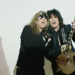 Black N' Blue Singer And Guitarist Team Up For New "Bombshell" Video as Thayer-St. James